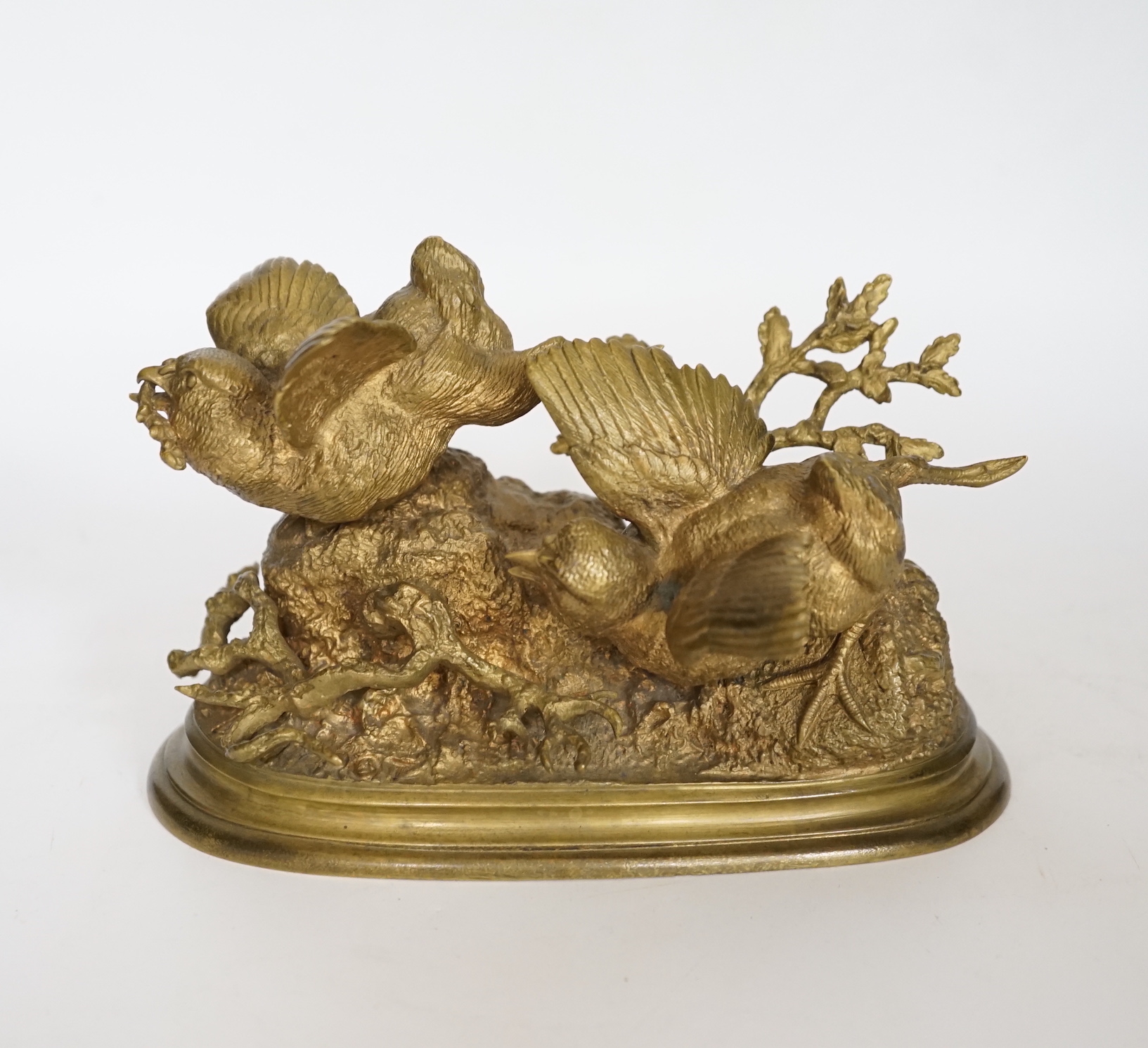 Ferdinand Pautrot (1832 - 1874), a French gilt bronze group of two birds, signed and inscribed Beaux Arts, 19cm wide